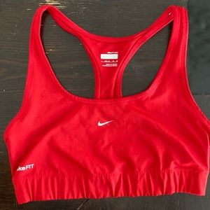 Red Nike sports bra in size M.